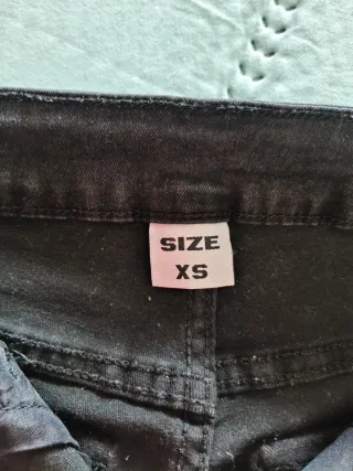 Pantalón vaquero negro flare mujer