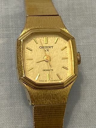 Lote bisutería: collares , reloj Orient, pulsera.