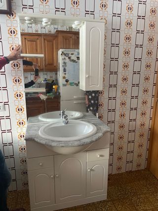 Mueble de baño con lavabo de mármol