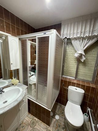Mueble de baño con lavabo de mármol