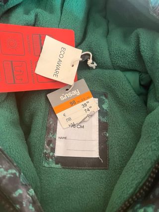 Mono de nieve infantil verde y negro