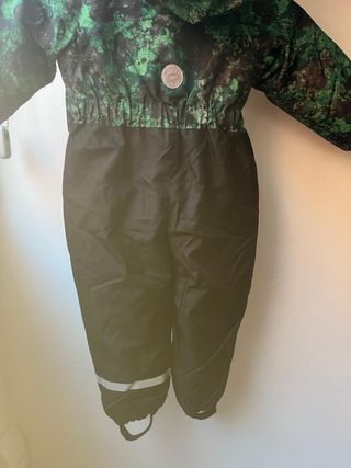 Mono de nieve infantil verde y negro