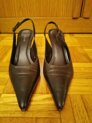 Zapatos Arezzo destalonados punta estrella