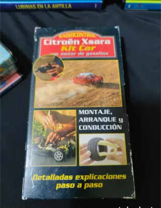 Lote de 34 dvd de pesca,mas 4 cinta vhs.