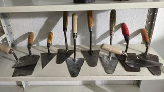 Lote de paletas de albañil, 10 unidades.