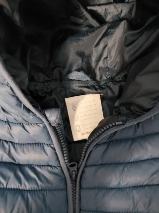 Plumífero azul bebé con capucha