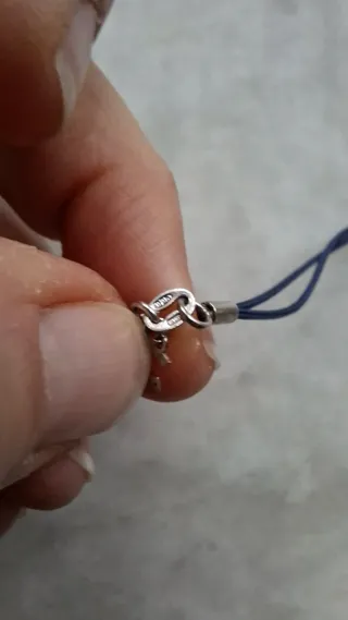 Bracciale cordino blu con stella oro