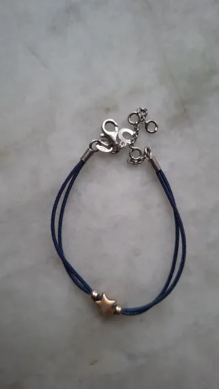 Bracciale cordino blu con stella oro