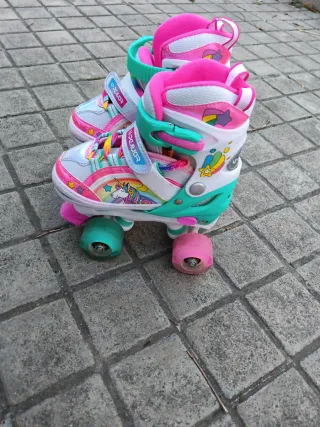 Patines de niña rosas y blancos