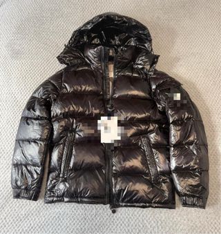 Piumino uomo nero lucido