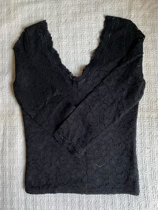 Blusa de encaje negra manga larga