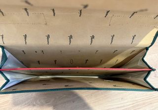 Mochila Puma, vintage, en rayas y multicolor.