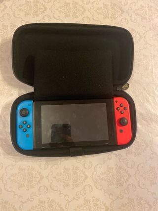 Nintendo Switch + Accesorios y Juegos