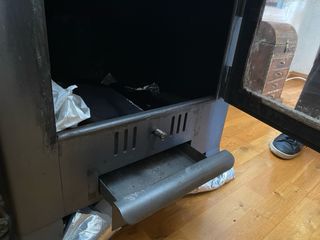 Estufa de hierro fundido negra/gris