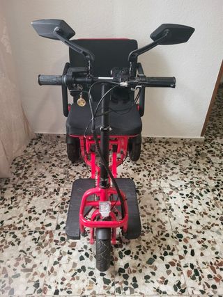 Carrito movilidad eléctrico plegable rojo.
