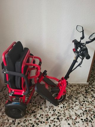 Carrito movilidad eléctrico plegable rojo.