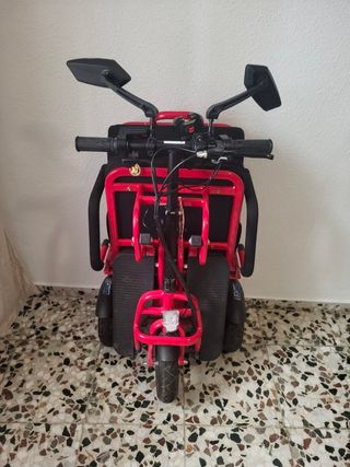 Carrito movilidad eléctrico plegable rojo.