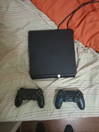 PS4 (PlayStation 4) Negra + 2 Mandos + 5 Juegos