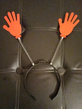 Cerchietto con mani a molla