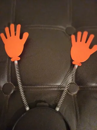 Cerchietto con mani a molla