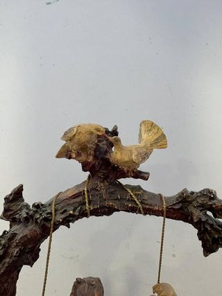 FIGURA DE PAREJA EN COLUMPIO