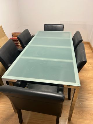 Mesa reuniones cristal 6 sillones cuero