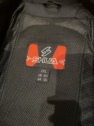 Mono de moto SHUA negro y verde