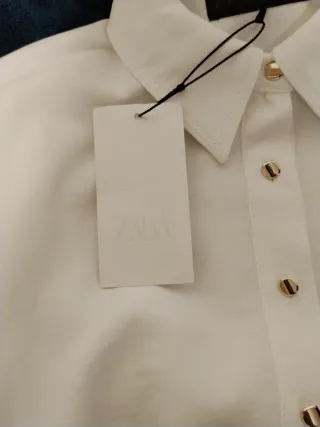 Mono blanco sin estrenar con etiqueta