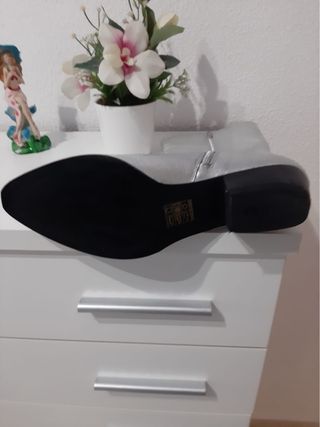 Botas plateadas de mujer