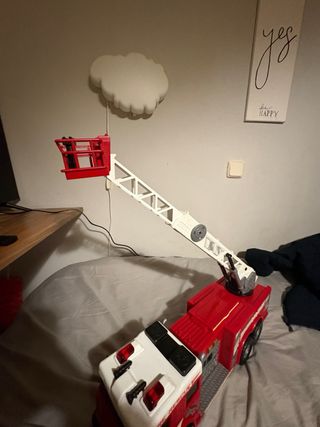 Camión de bomberos con escalera