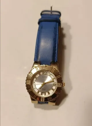 Reloj Guess esfera dorada y correa piel azul