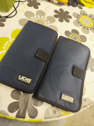 2 Estuches porta CDs UDG