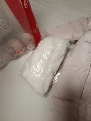 Mono nieve bebé niña rosa con gorro