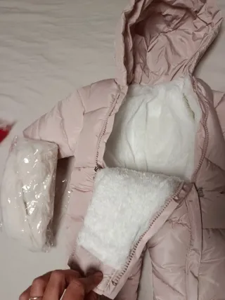 Mono nieve bebé niña rosa con gorro