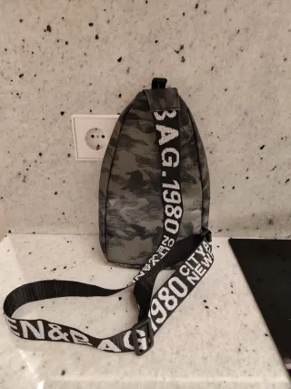 Riñonera lateral hombre.