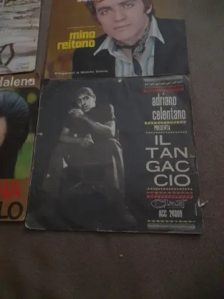 4 dischi 45 giri Adriano Celentano Mino Reitano