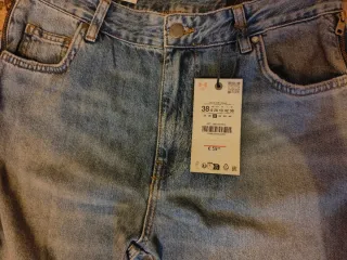 Pantalón vaquero ancho con cremallera