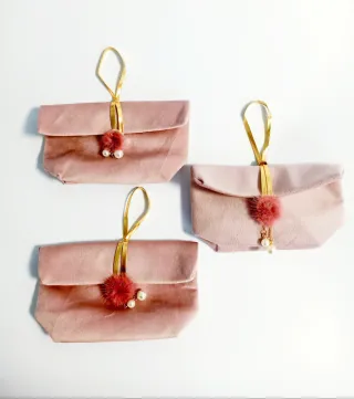 Pochette Camoscio Rosa con Pompon Peloso Rosa