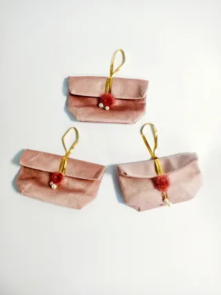 Pochette Camoscio Rosa con Pompon Peloso Rosa