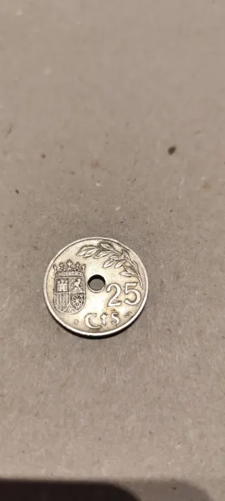 Moneda 25 Cts con agujero