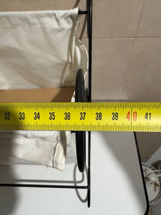 Revistero de metal y tela