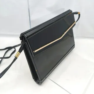 Pochette rara in bachelite nera