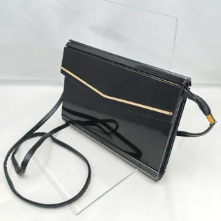 Pochette rara in bachelite nera