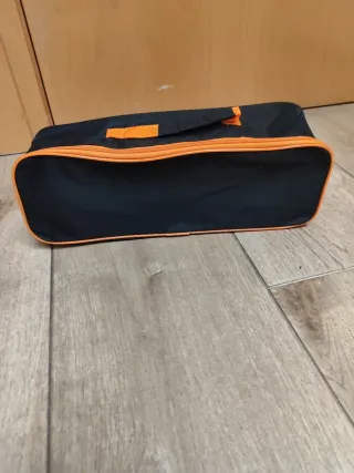 Neceser negro y naranja nuevo a estrenar