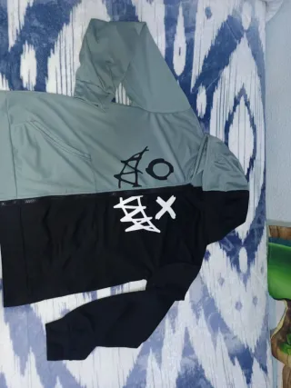 Chaqueta deportiva T16 verdoso y negra