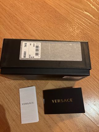 Gafas de sol Versace mujer negras y doradas