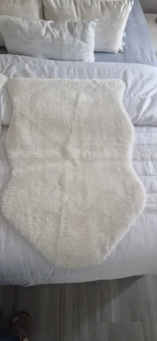 Dos alfombras blancas