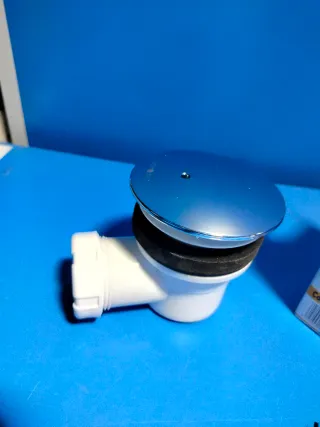 Sifón extra bajo para plato de ducha