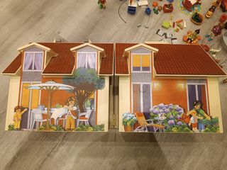 Lote de Playmobil con casa para guardar