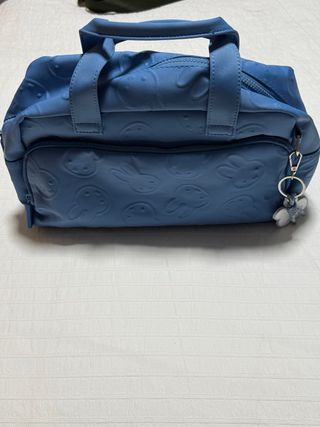 Neceser azul con estampado